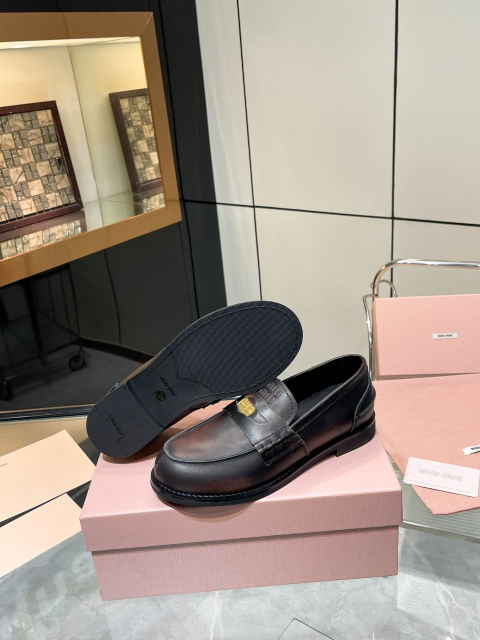 PENNY LOAFERS IN BLACK WITH A RED UNDERTONE CALFSKIN